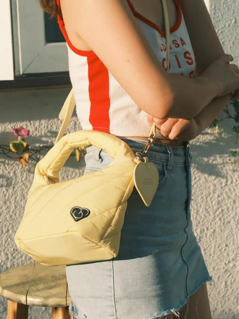 Pastel Yellow hand bag in side sling