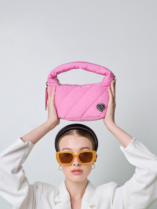 Pink coloured women handbag