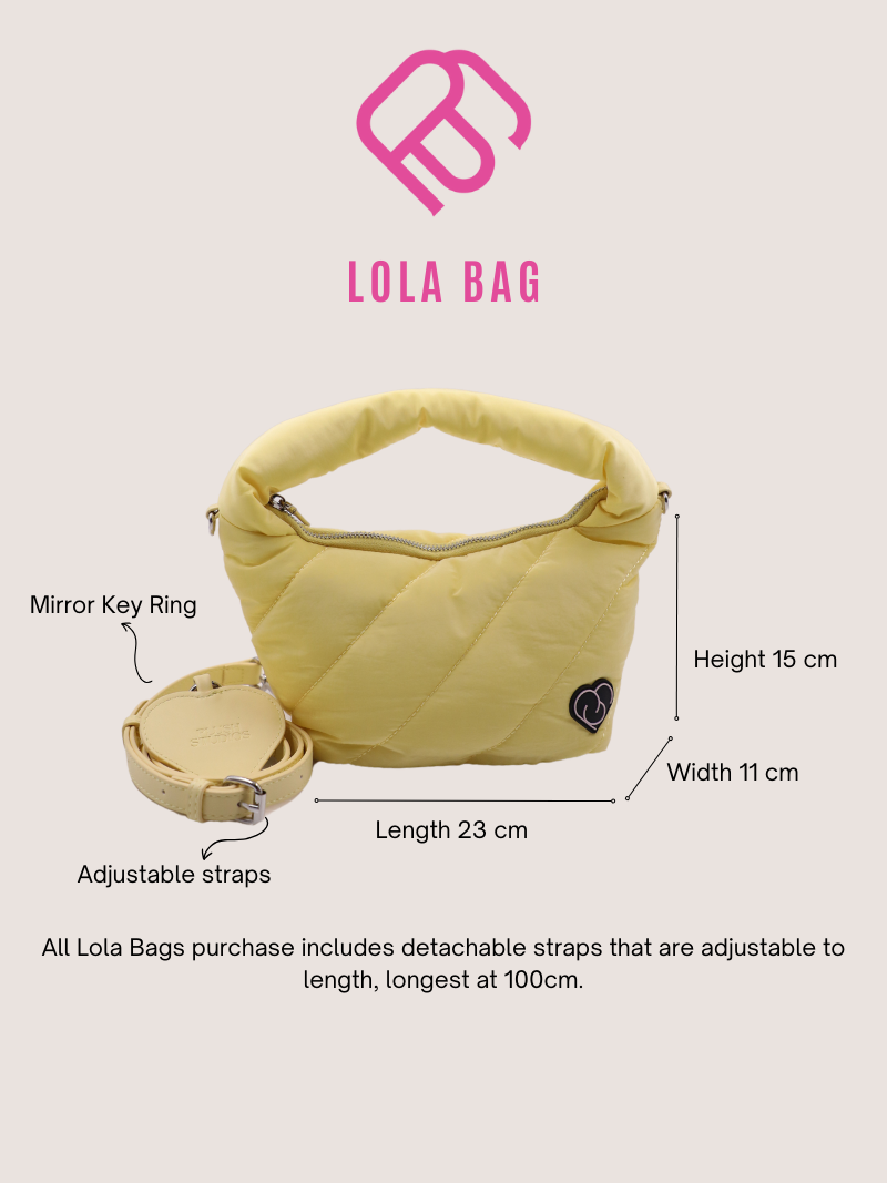 Cushion pastel yellow handbag with adjustable and detachable strap detail