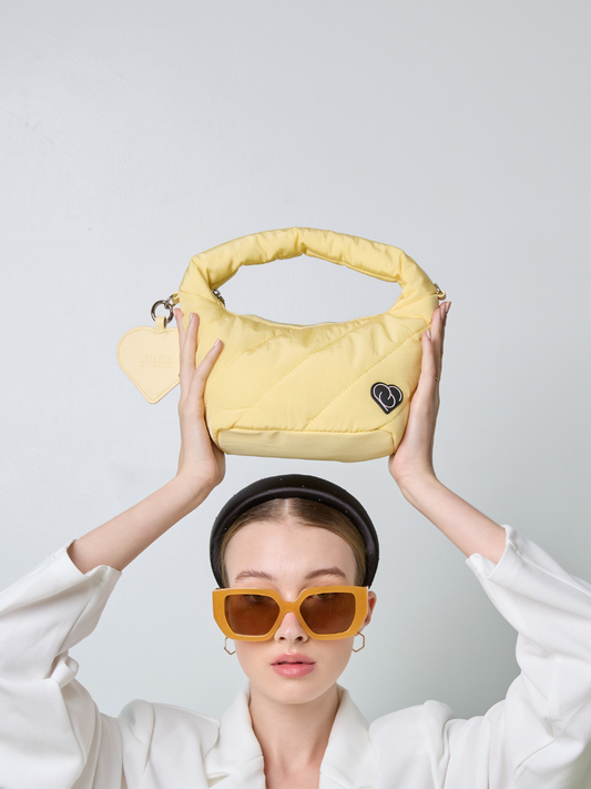 Cushion Female Handbag in light yellow colour