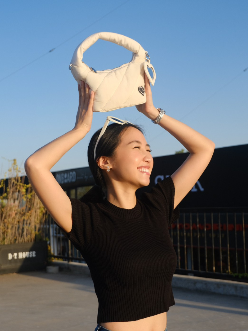 White coloured cushion bag side view